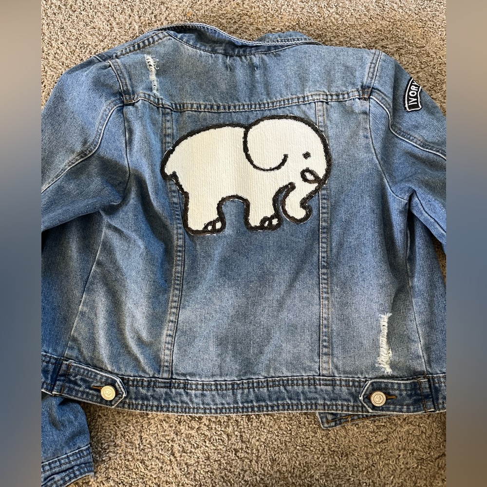 Ivory Ella Jean Jacket with sequined Elephant Logo on back